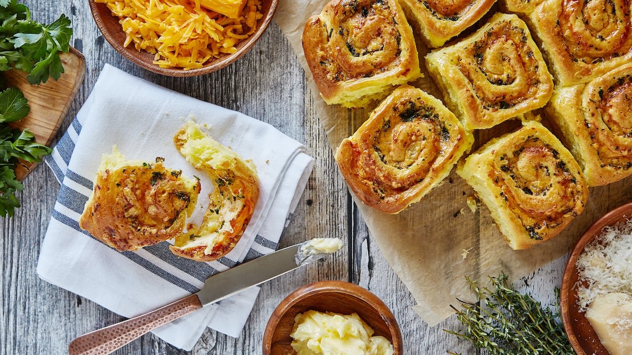 default-339 Overhead view of savory buns with butter on a kitchen towel